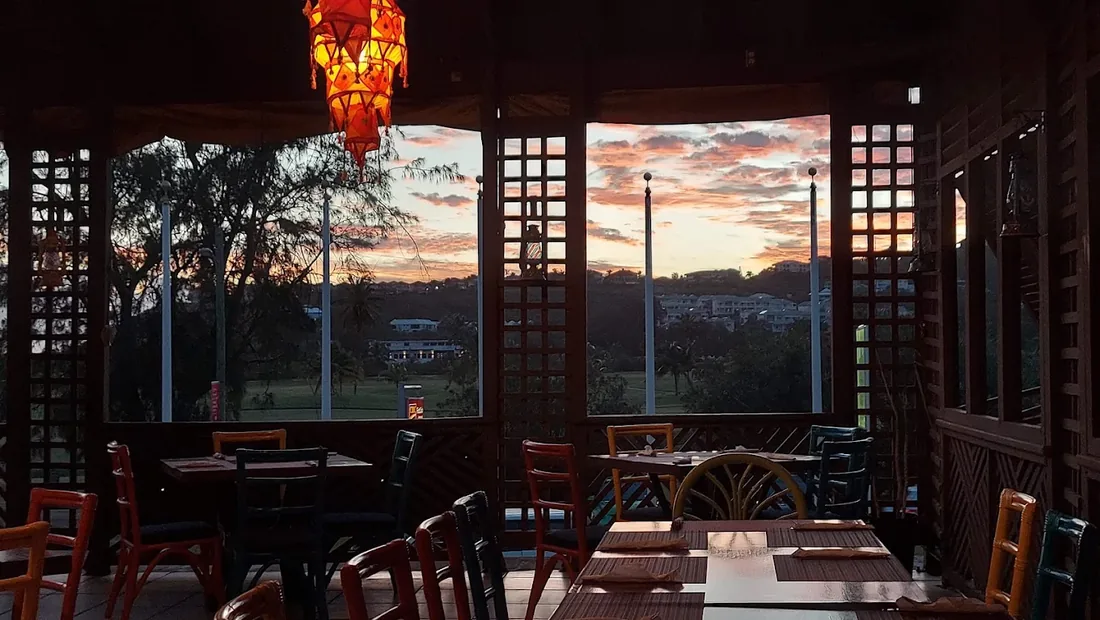 Indian Summer terrace seating at sunset in Frigate Bay
